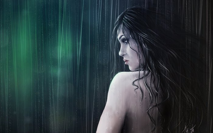 Woman with bare shoulders in the rain