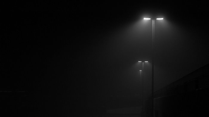 Street lights in fog at night