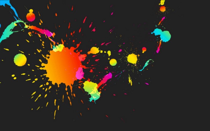 Colorful paint splatters on black background