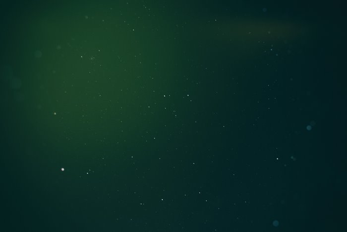Green gradient with scattered white dots