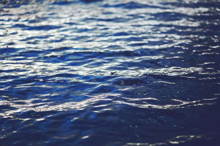 Close up of rippled blue water surface