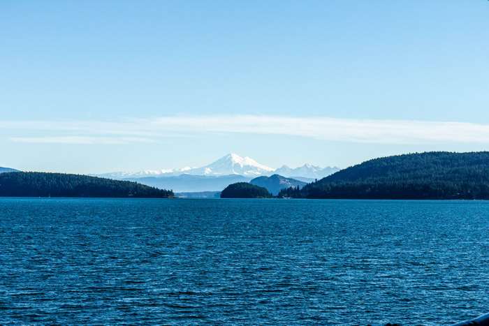 Blue Salt Water Landscape with Snow-Capped Mountains