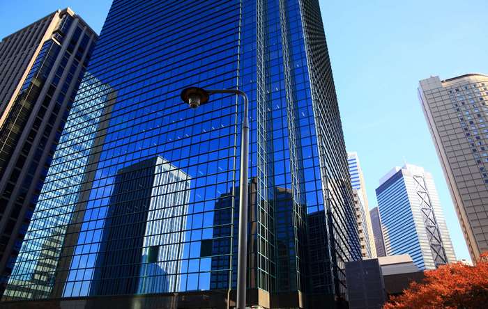 Modern skyscrapers with blue glass facades in a city