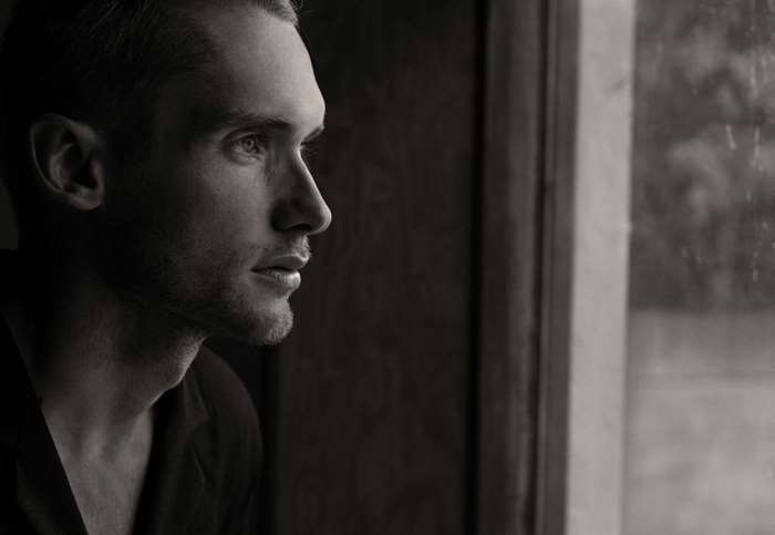 Black and white portrait of a thoughtful man