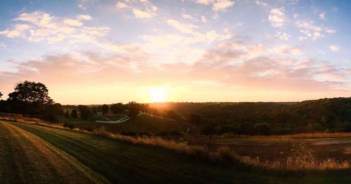 Countryside farm fields at sunset 4K