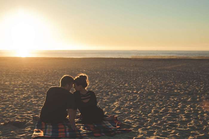 Couple on Beach at Sunset