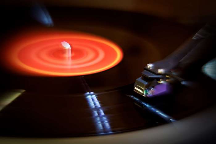 Turntable playing a record with long exposure