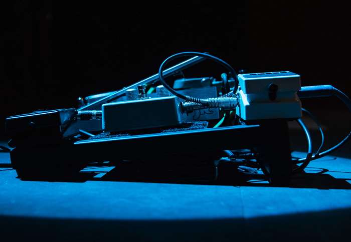 Guitar pedals with blue spotlight