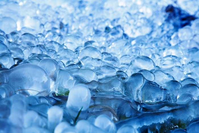 Close-up of frozen water droplets and ice formations