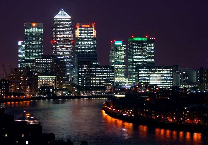 Canary Wharf skyscrapers at night with river