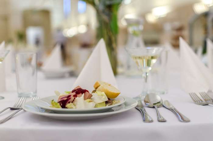 Elegant table setting with food and drink
