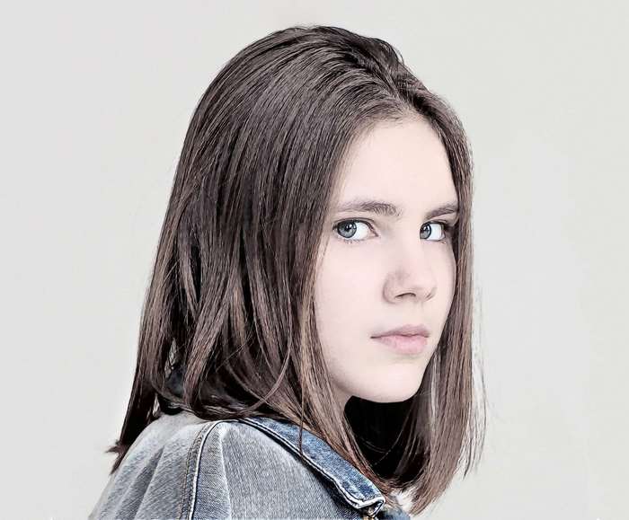 Portrait of a young girl with brown hair