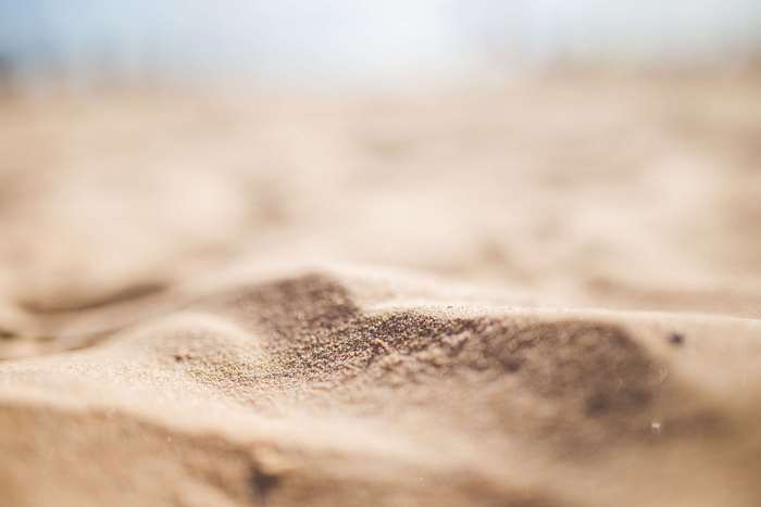 Close-up of sand texture with blurred background