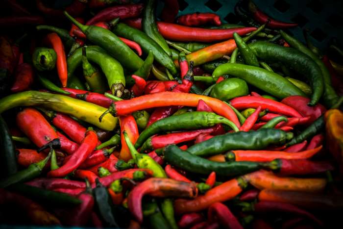 Pile of colorful chili peppers 4K