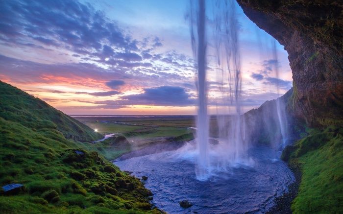 Seljalandsfoss waterfall at sunset in Iceland