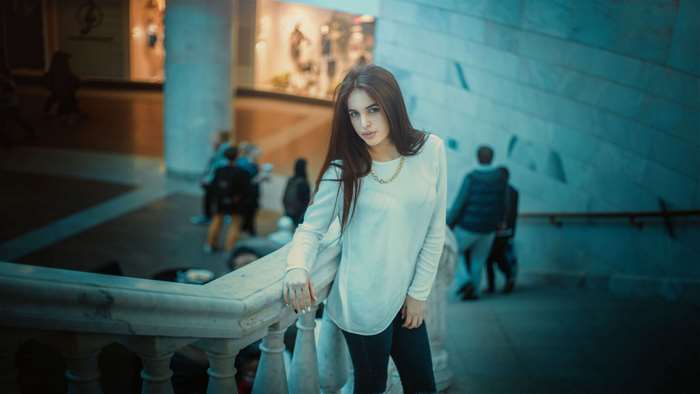 Woman on stairs in a shopping mall