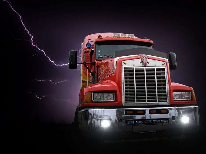 Red Kenworth Truck with Lightning Storm