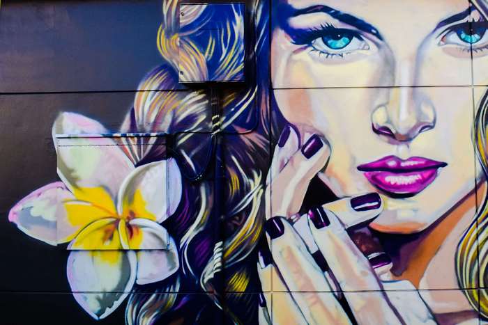 Graffiti of a woman with a flower