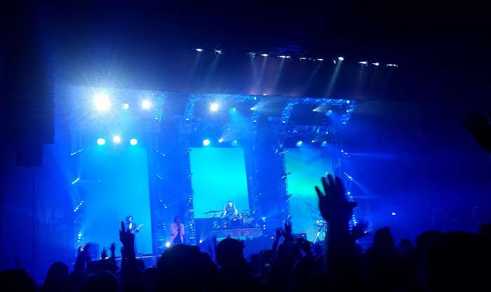 Newsboys live concert on stage with bright lights