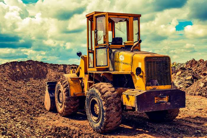 Yellow Allis-Chalmers Wheel Loader in a Construction Site