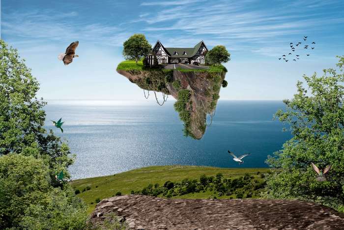 Floating island with house and birds over the sea