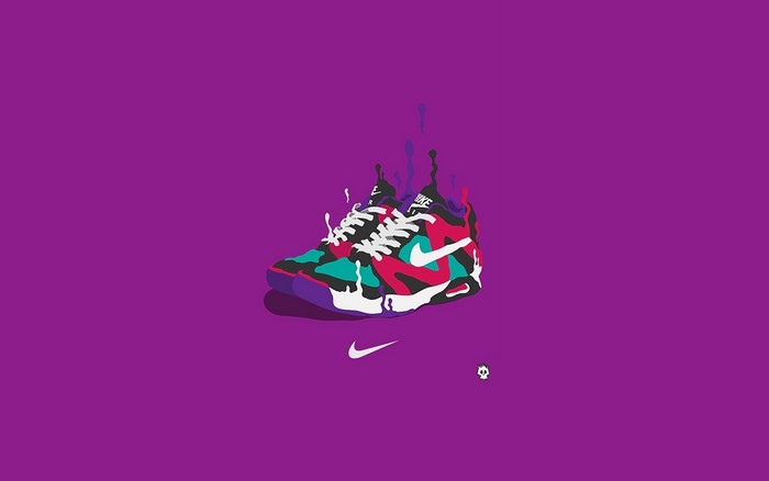 Nike sneakers with colorful paint drips on purple background