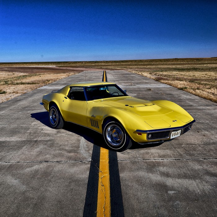 Yellow 1969 Chevrolet Corvette on Runway
