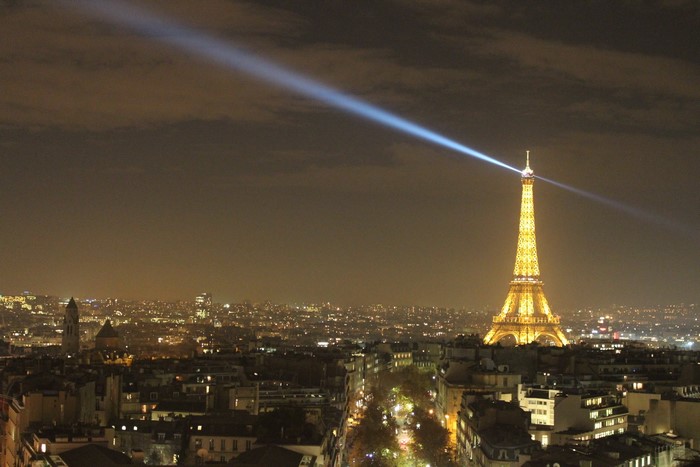 Eiffel Tower at Night with City Lights in Paris