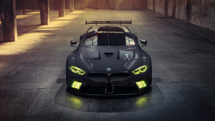 BMW M8 GTE race car in a warehouse