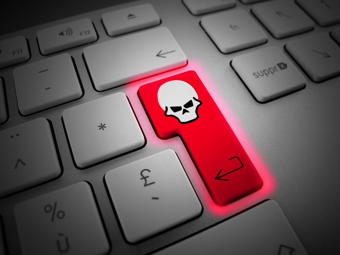 Enter key with skull symbol on keyboard