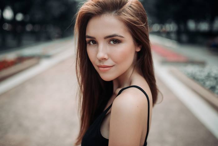 Portrait of a Young Brunette Woman Outdoors