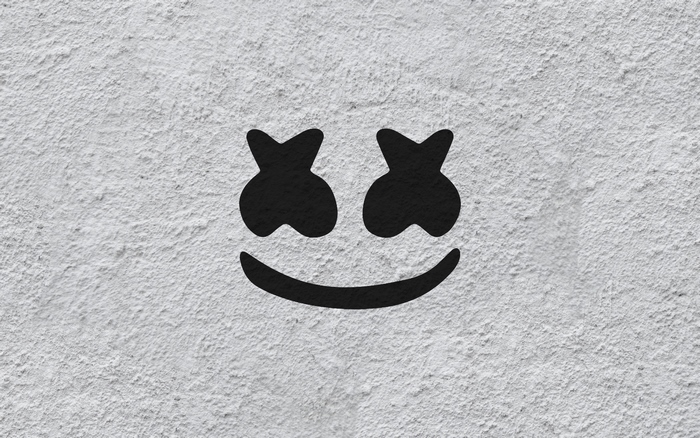 Marshmello logo on a textured wall