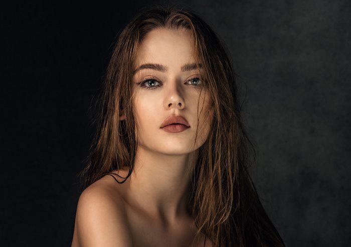 Portrait of a Woman with Wet Hair and Intense Stare