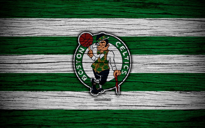 Boston Celtics logo on green and white striped wooden background