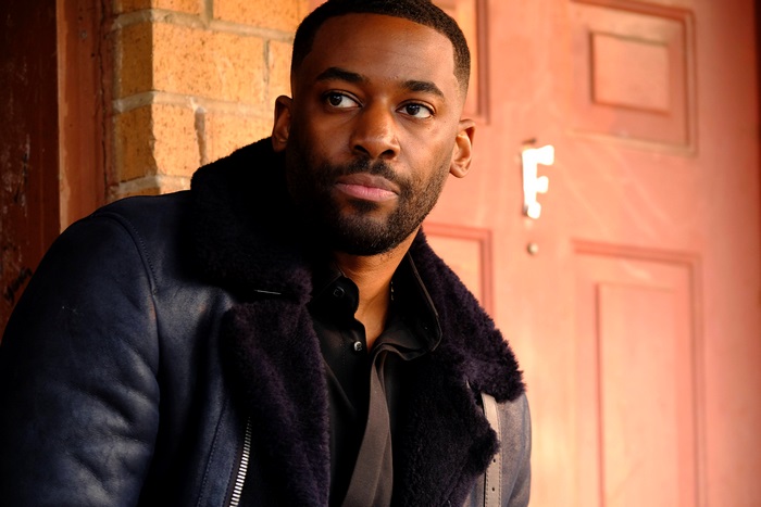 Ashley Thomas wearing a blue shearling jacket