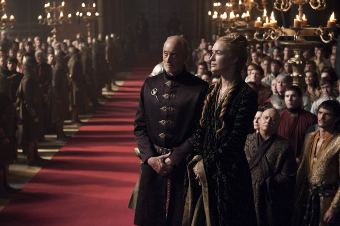 Tywin Lannister and Cersei Lannister in a hall