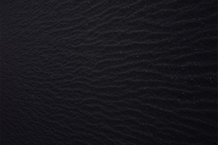 Black Textured Sand Ripple Pattern