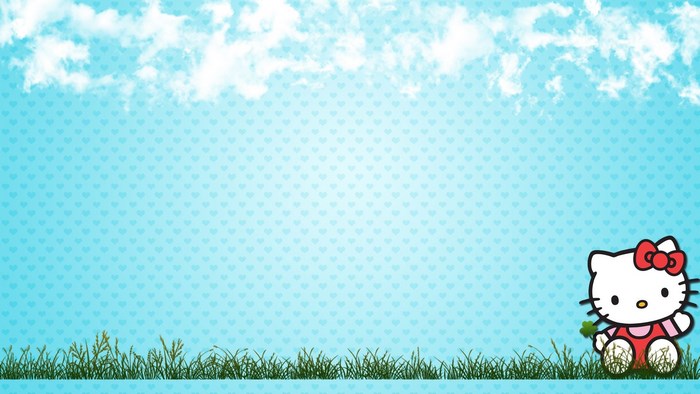 Hello Kitty sitting in grass with clouds