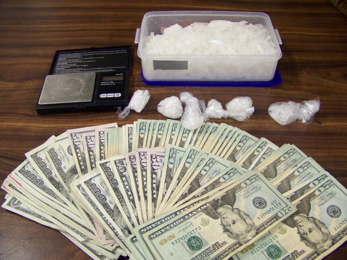 Money, Drugs, and Scale on Table