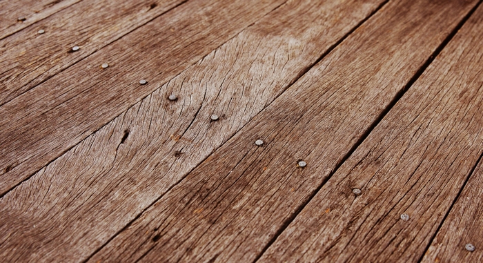 Weathered wooden planks with nails