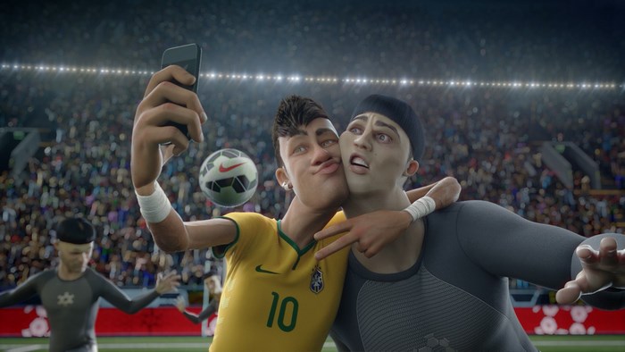 Neymar and teammate taking a selfie with a soccer ball