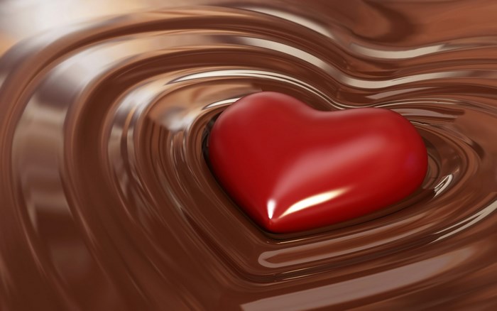 Red heart in swirling chocolate