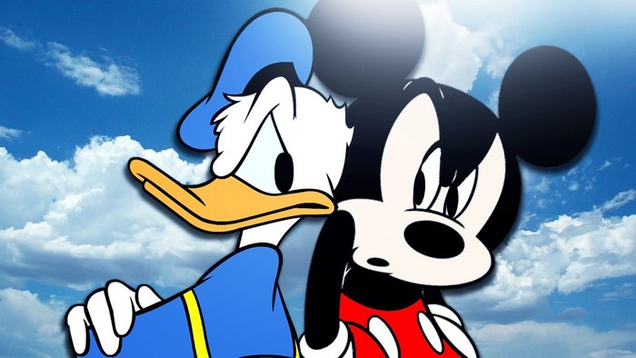 Mickey Mouse and Donald Duck against the sky