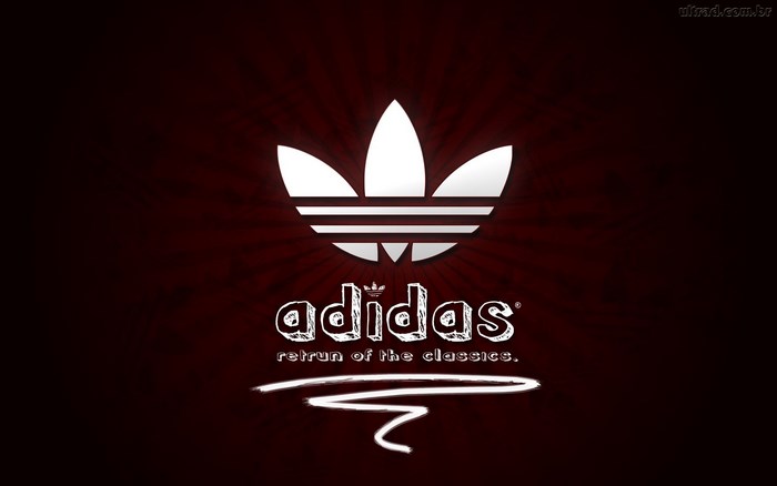 Classic Adidas Trefoil Logo on Dark Background