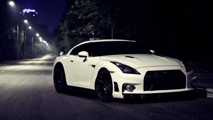 White Nissan GT-R on a Dimly Lit Street