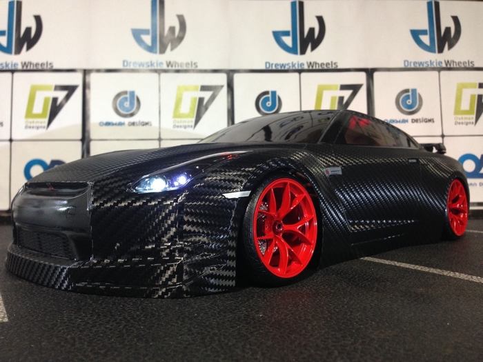 Nissan GT-R with carbon fiber body and red wheels