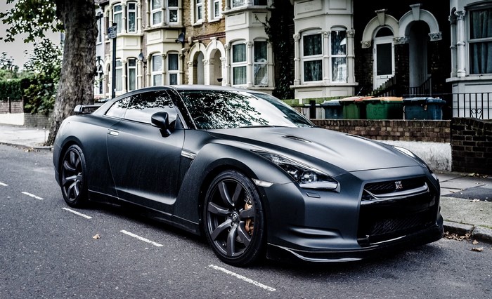 Matte black Nissan GT-R parked on a street