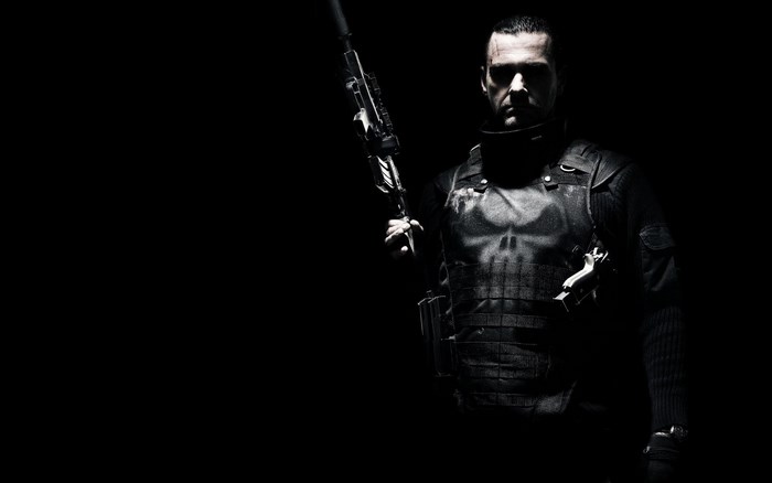 The Punisher holding a rifle