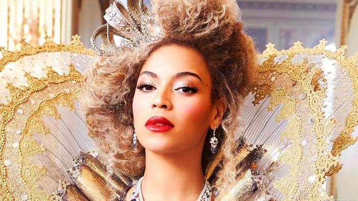 Beyoncé in regal attire with crown and jewels