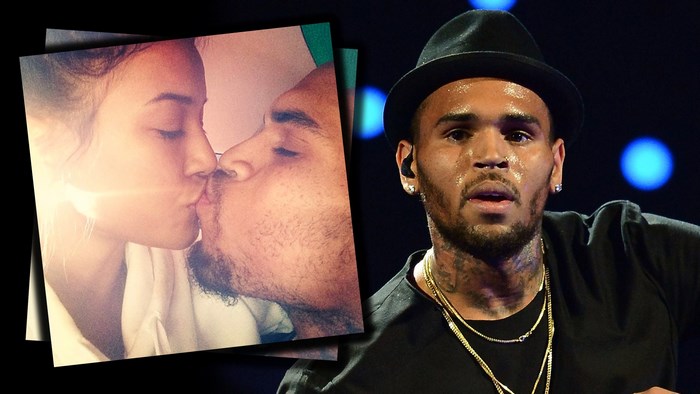 Chris Brown kissing a woman